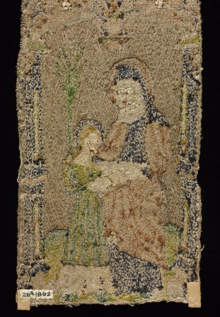 Envers d'une broderie médiévale. On distingue parfaitement le dessin (une vierge à l'enfant).